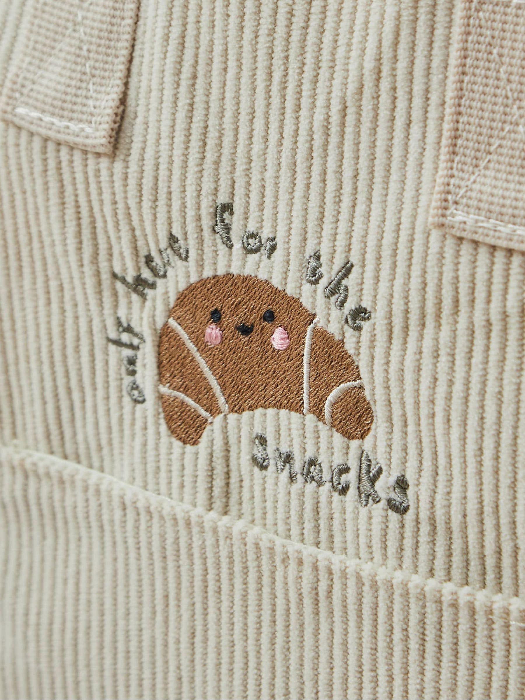 My 1st Years ecru cord backpack with croissant embroidery (British brand)