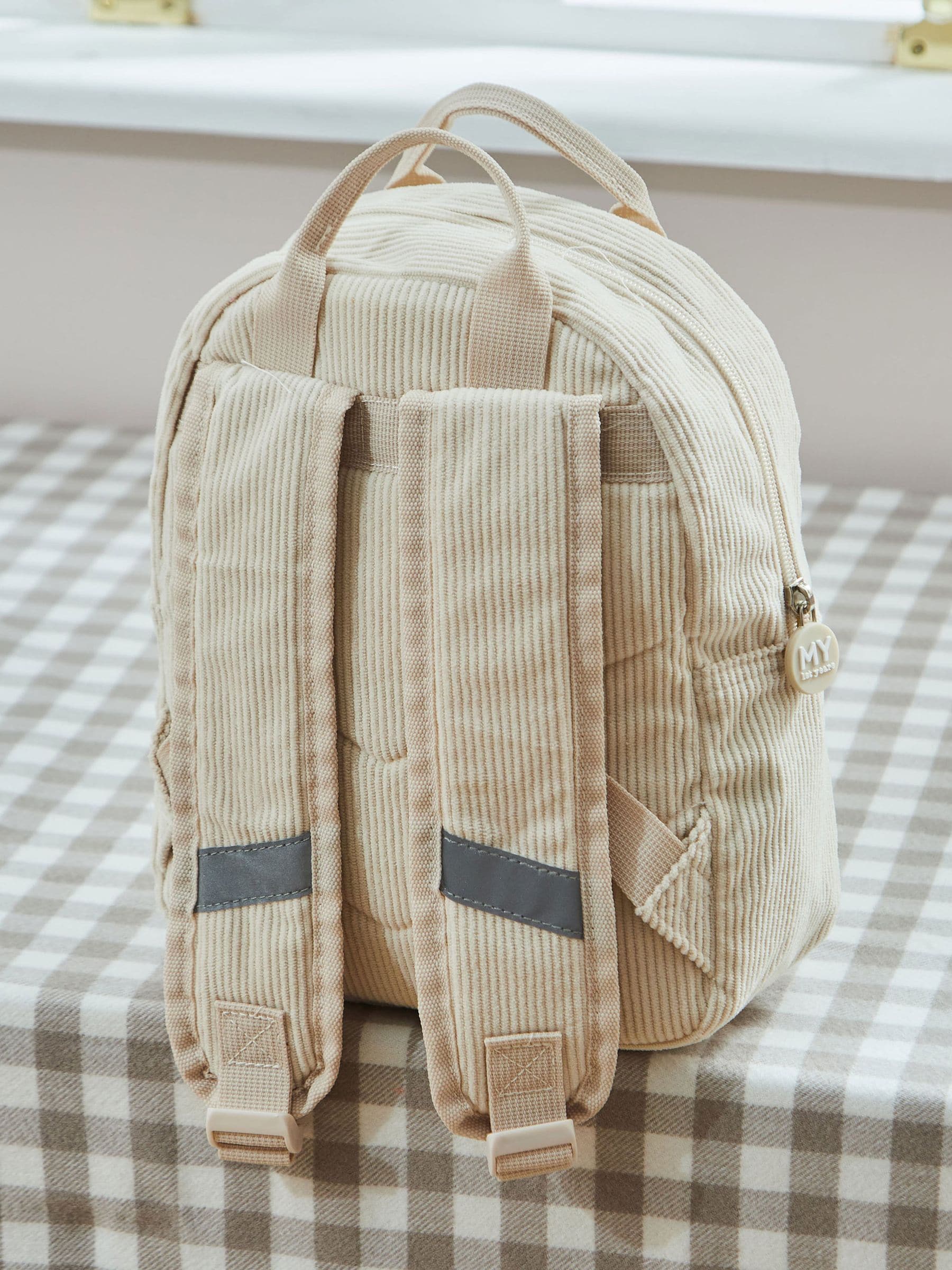 My 1st Years ecru cord backpack with croissant embroidery (British brand)