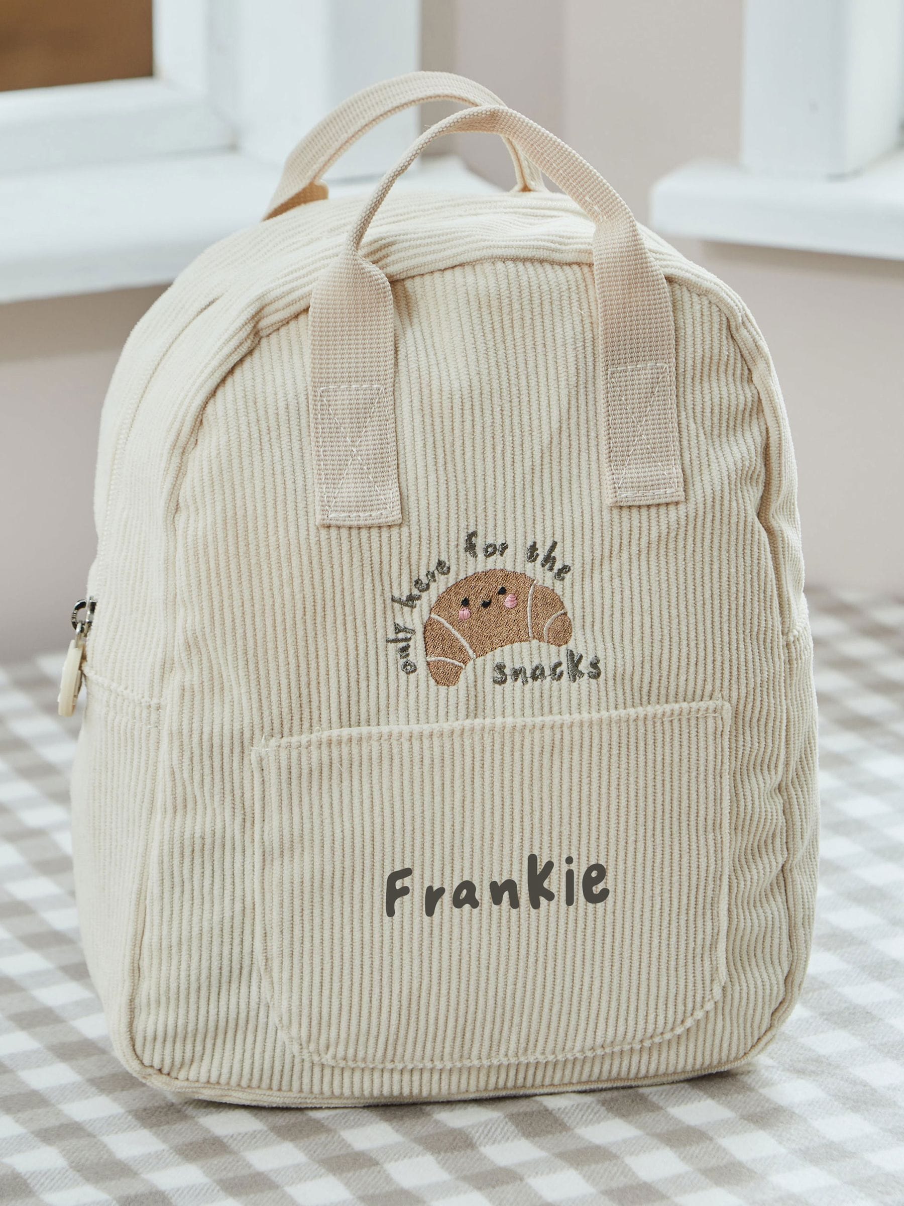 My 1st Years ecru cord backpack with croissant embroidery (British brand)
