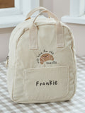 My 1st Years ecru cord backpack with croissant embroidery (British brand)
