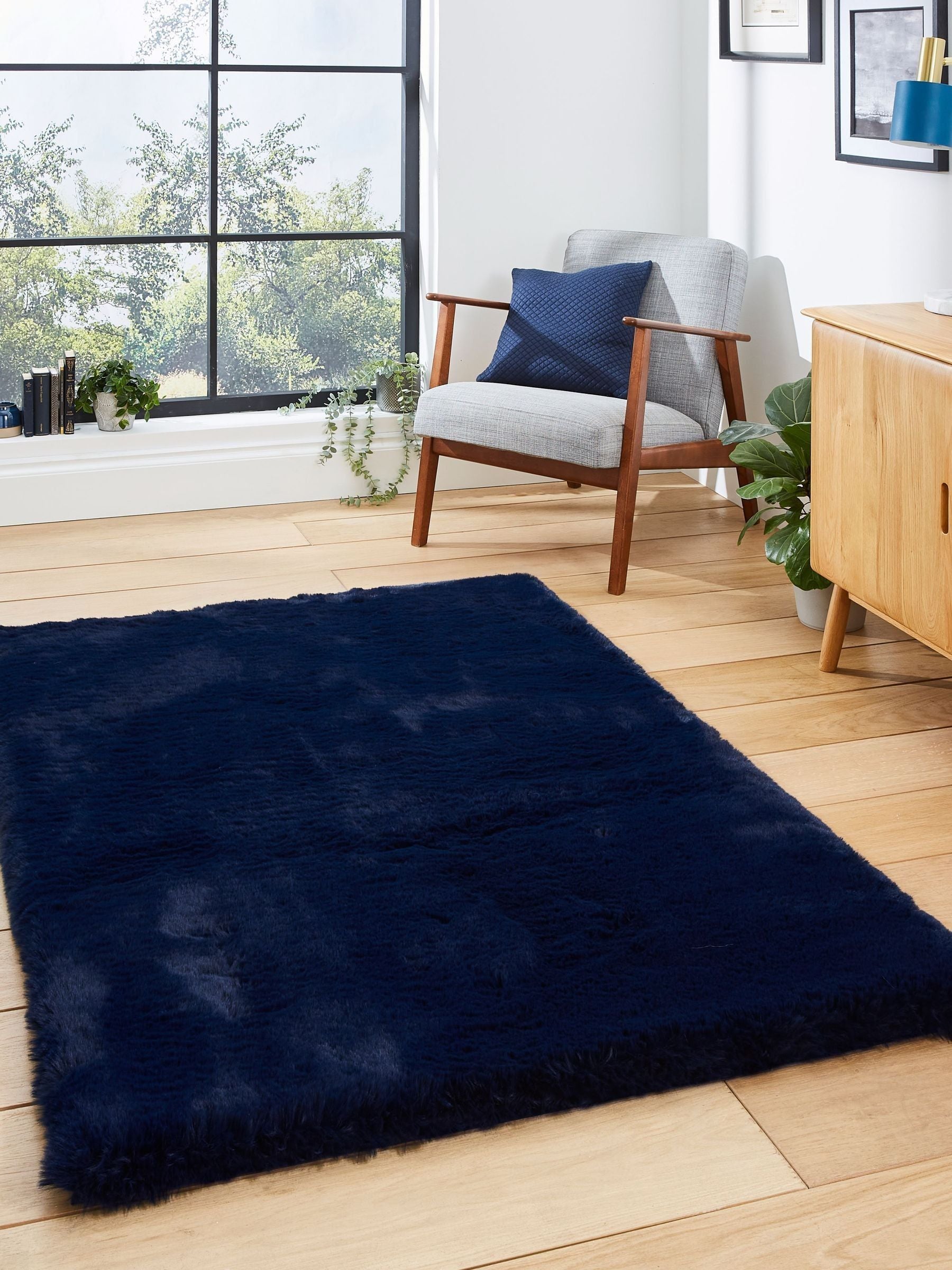 Think Rugs Navy Super Teddy plain shaggy rug (British brand)