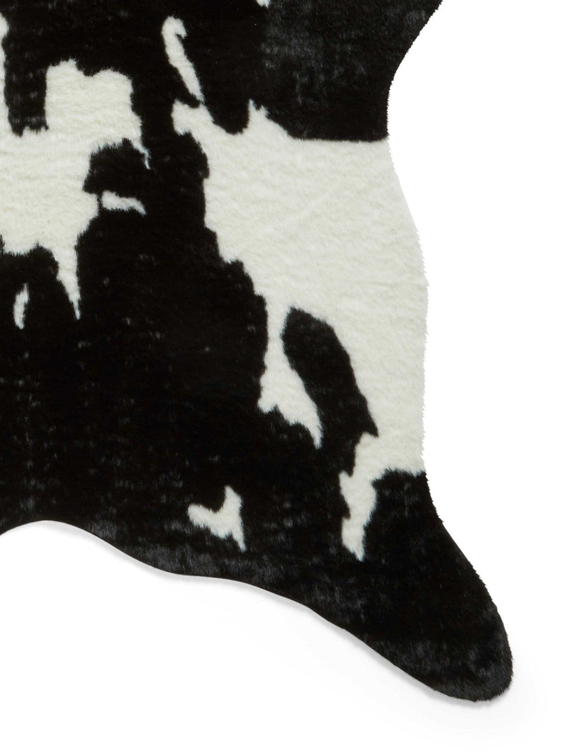 Think Rugs faux cow rug black faux fur, imported from the UK