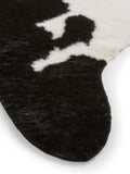 Think Rugs faux cow rug black faux fur, imported from the UK