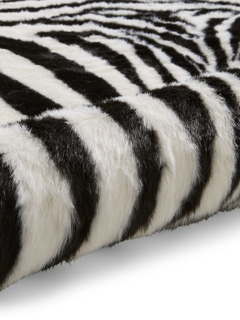 Think Rugs faux fur zebra rug, imported from the UK