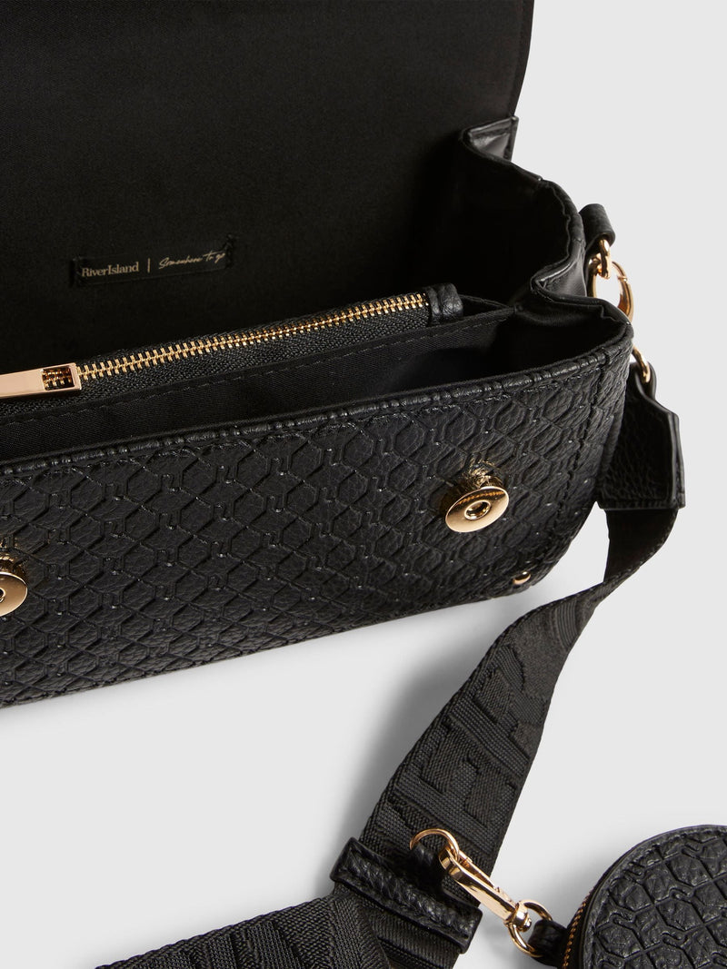 River Island black cross body bag with flap detail, UK version