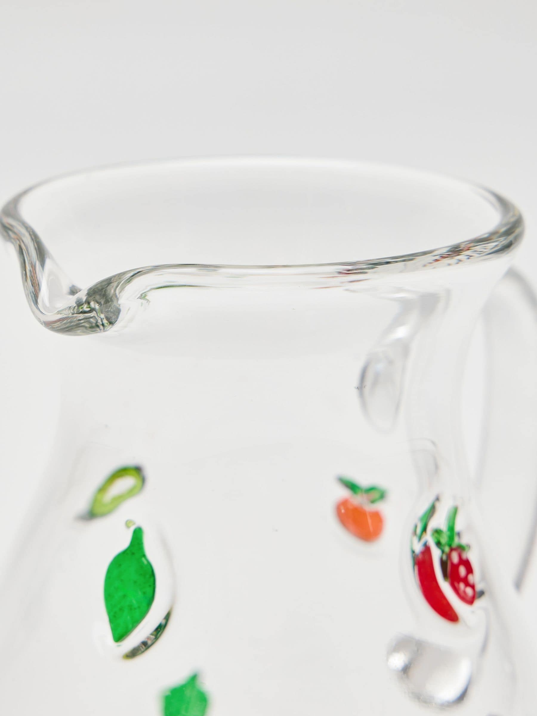 Oliver Bonas clear glass cocktail jug with fruit motifs, imported from the UK