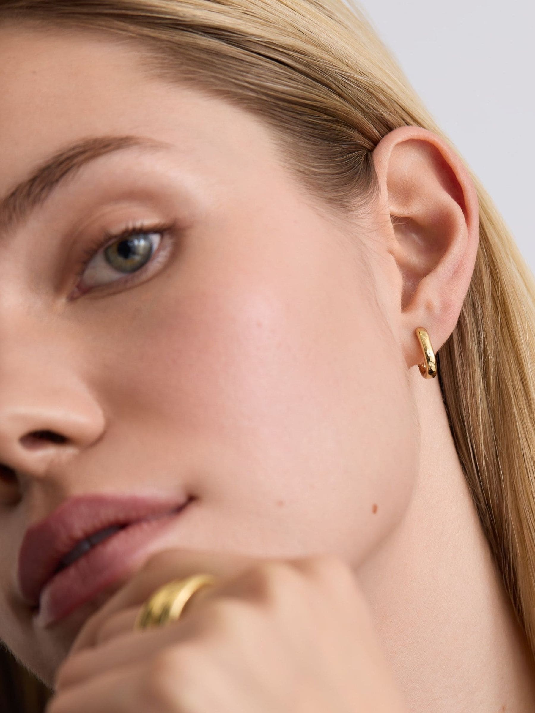 D.LOUISE gold tone oval huggie earrings, UK version
