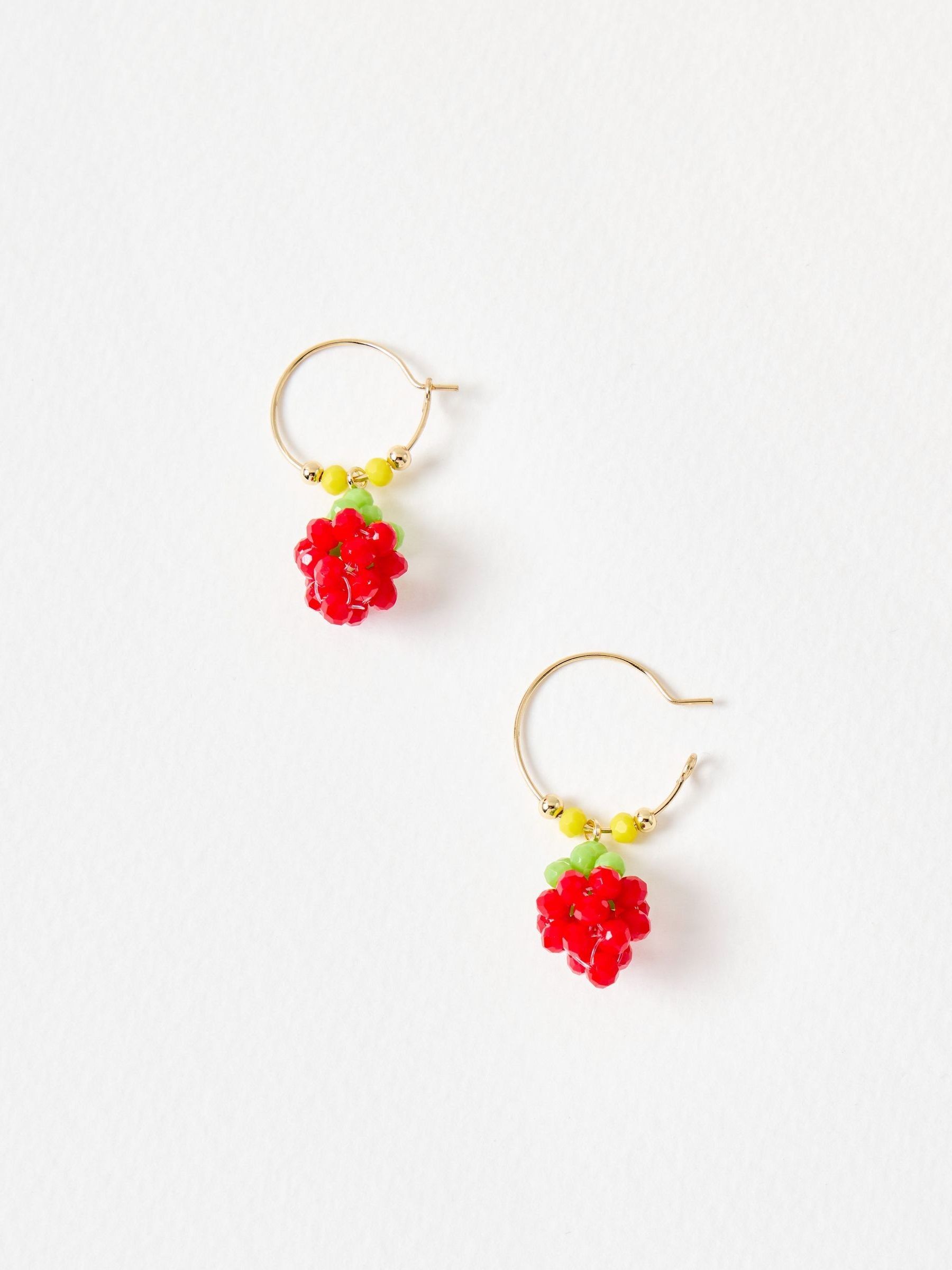 Oliver Bonas strawberry charm hoop earrings gold tone (British brand)