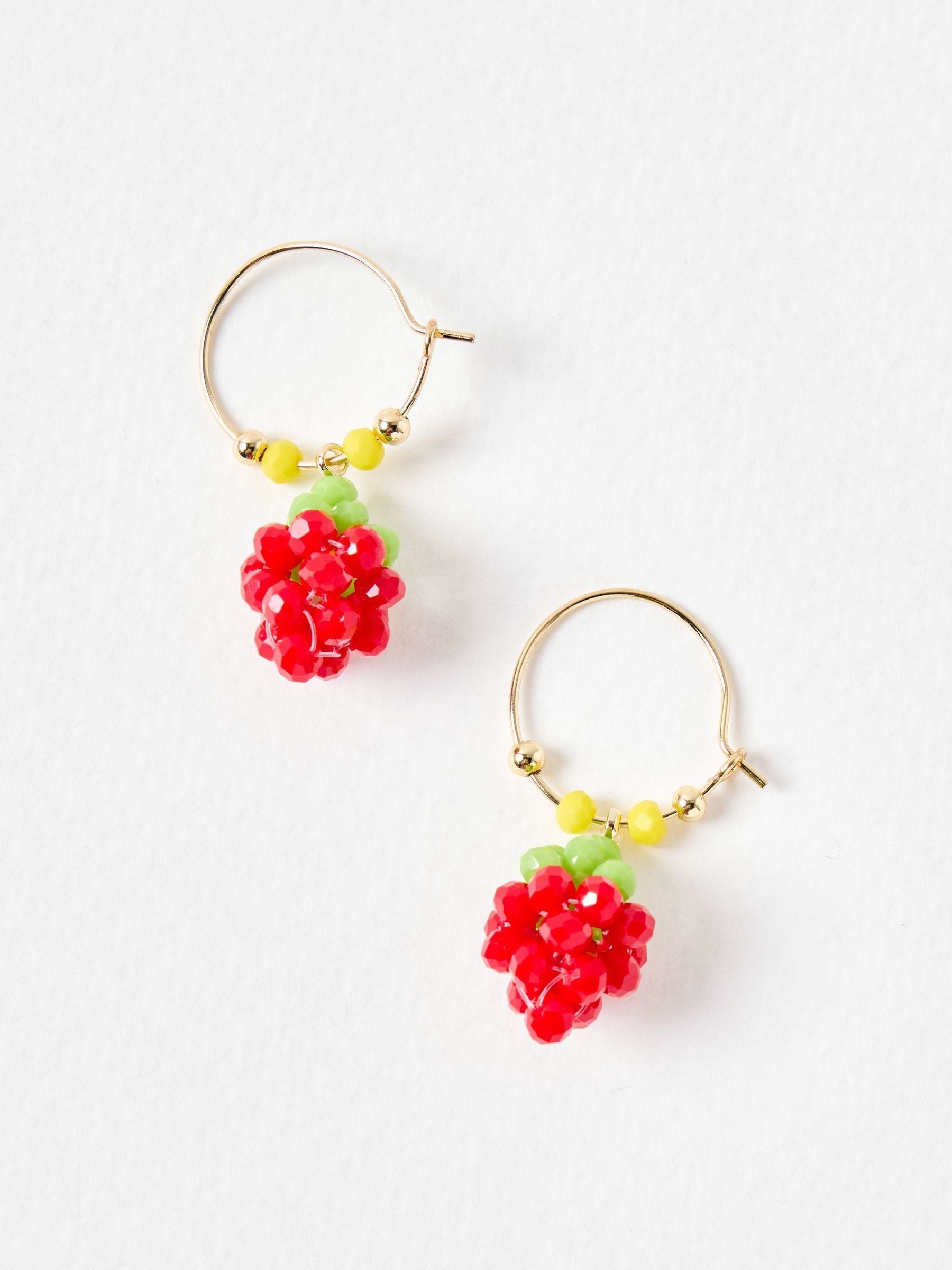 Oliver Bonas strawberry charm hoop earrings gold tone (British brand)