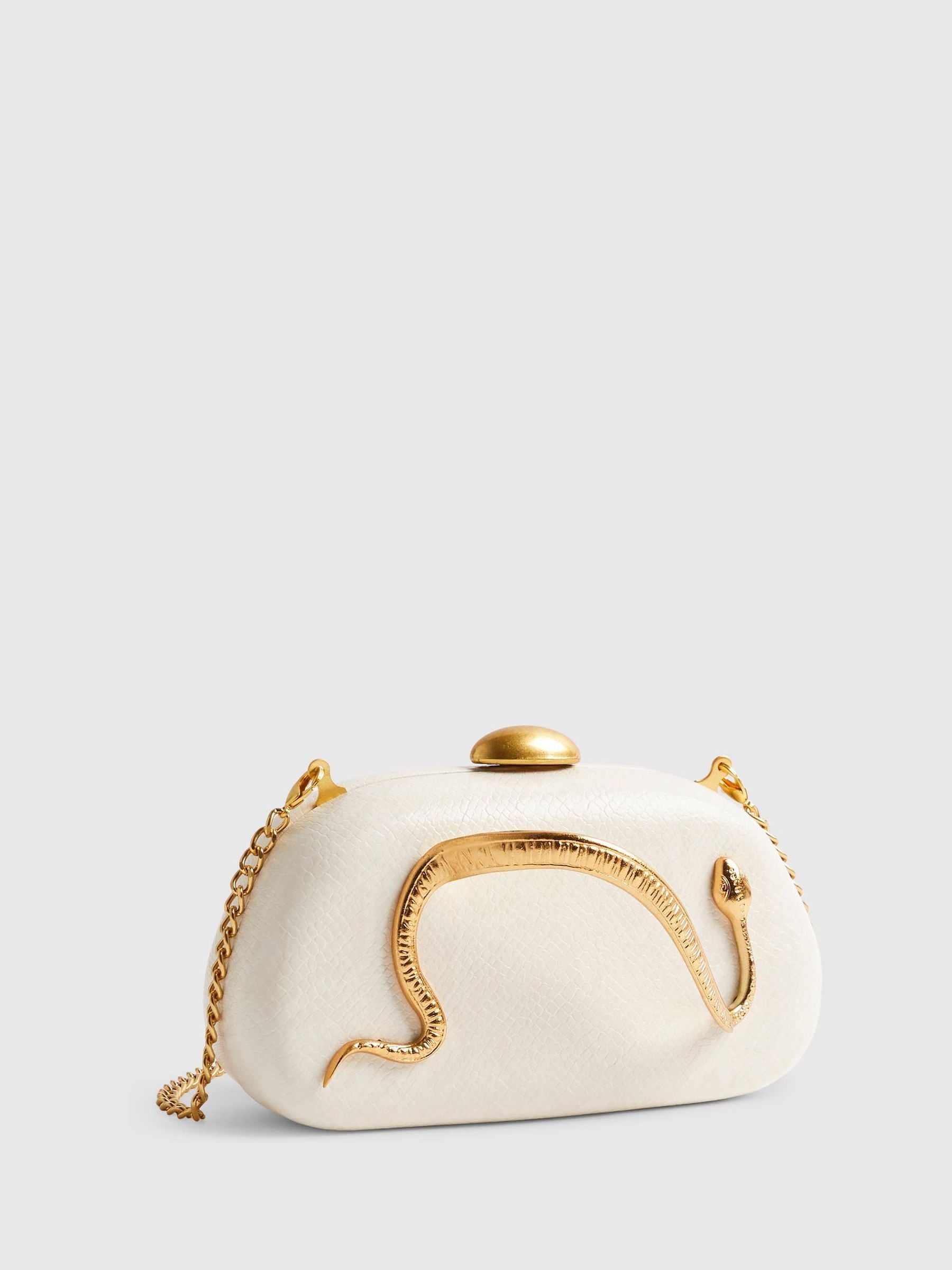 River Island cream snake print clutch bag, imported from the UK