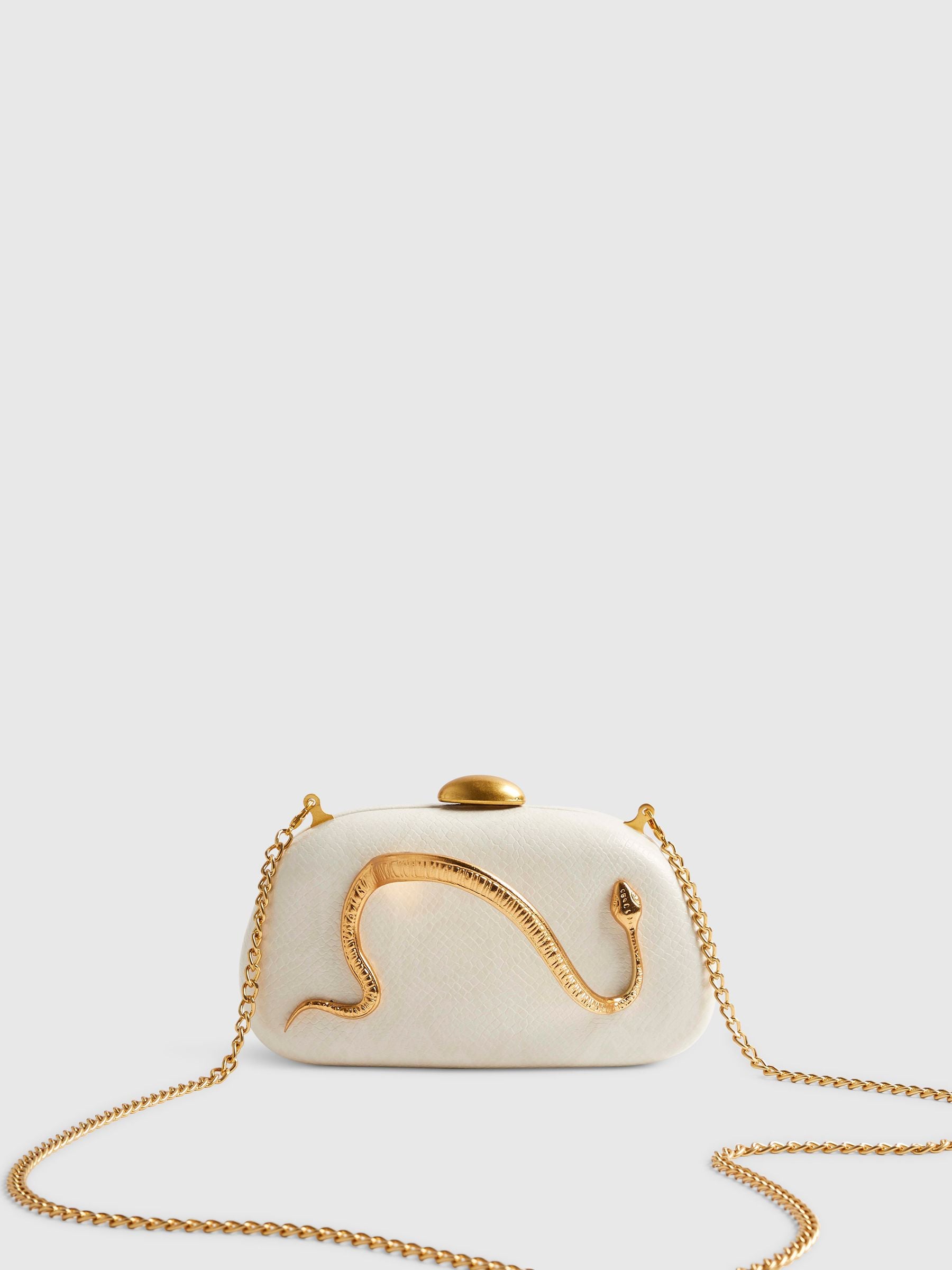River Island cream snake print clutch bag, imported from the UK