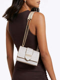 Carvela cream Jessica micro bag in champagne metallic, UK version