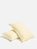 Oliver Bonas yellow muslin striped pillowcases, imported from the UK