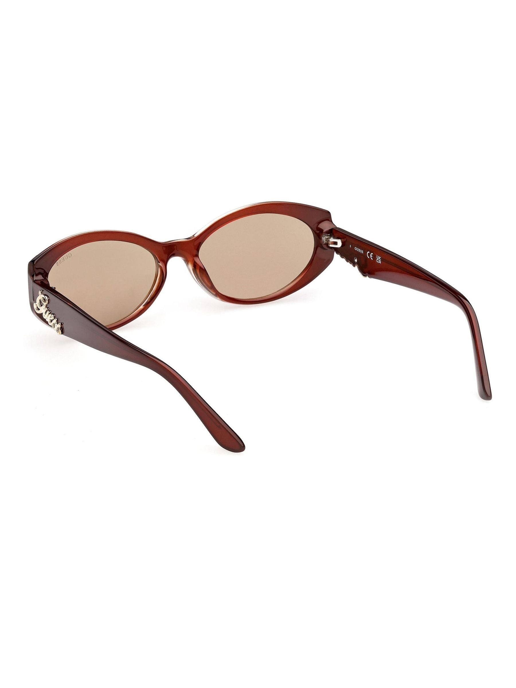 Guess brown injected sunglasses with oval shape and Guess logo - British product