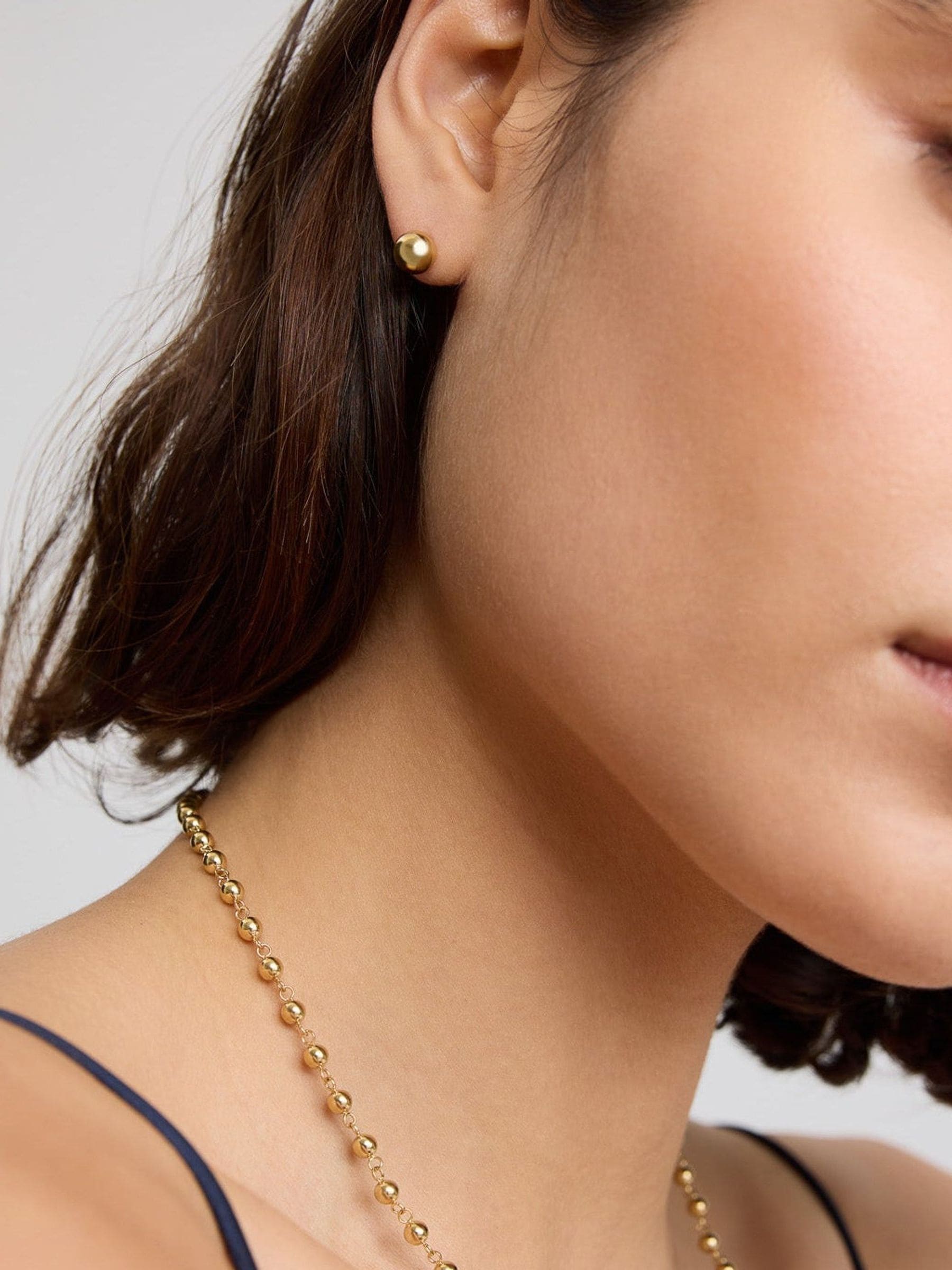 D.LOUISE gold tone waterproof mini bauble studs (British brand)