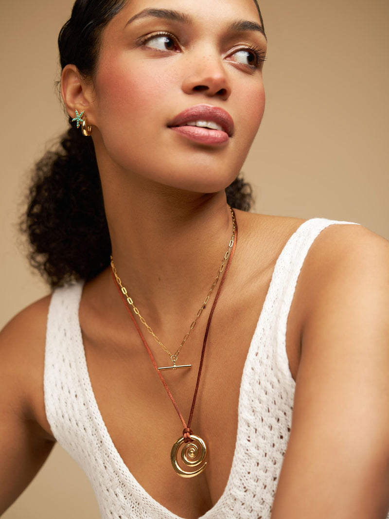 Orelia London gold tone statement spiral cord adjustable necklace, imported from the UK