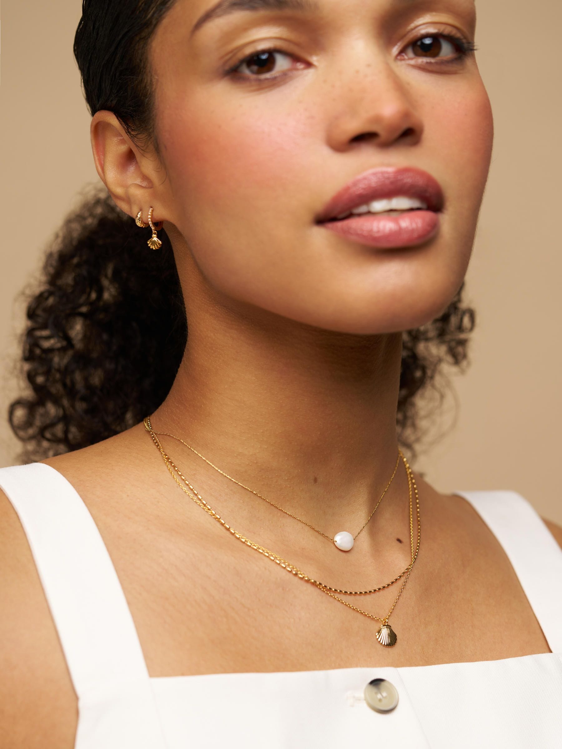 Orelia London earrings gold tone pearl shell micro hoop - British product