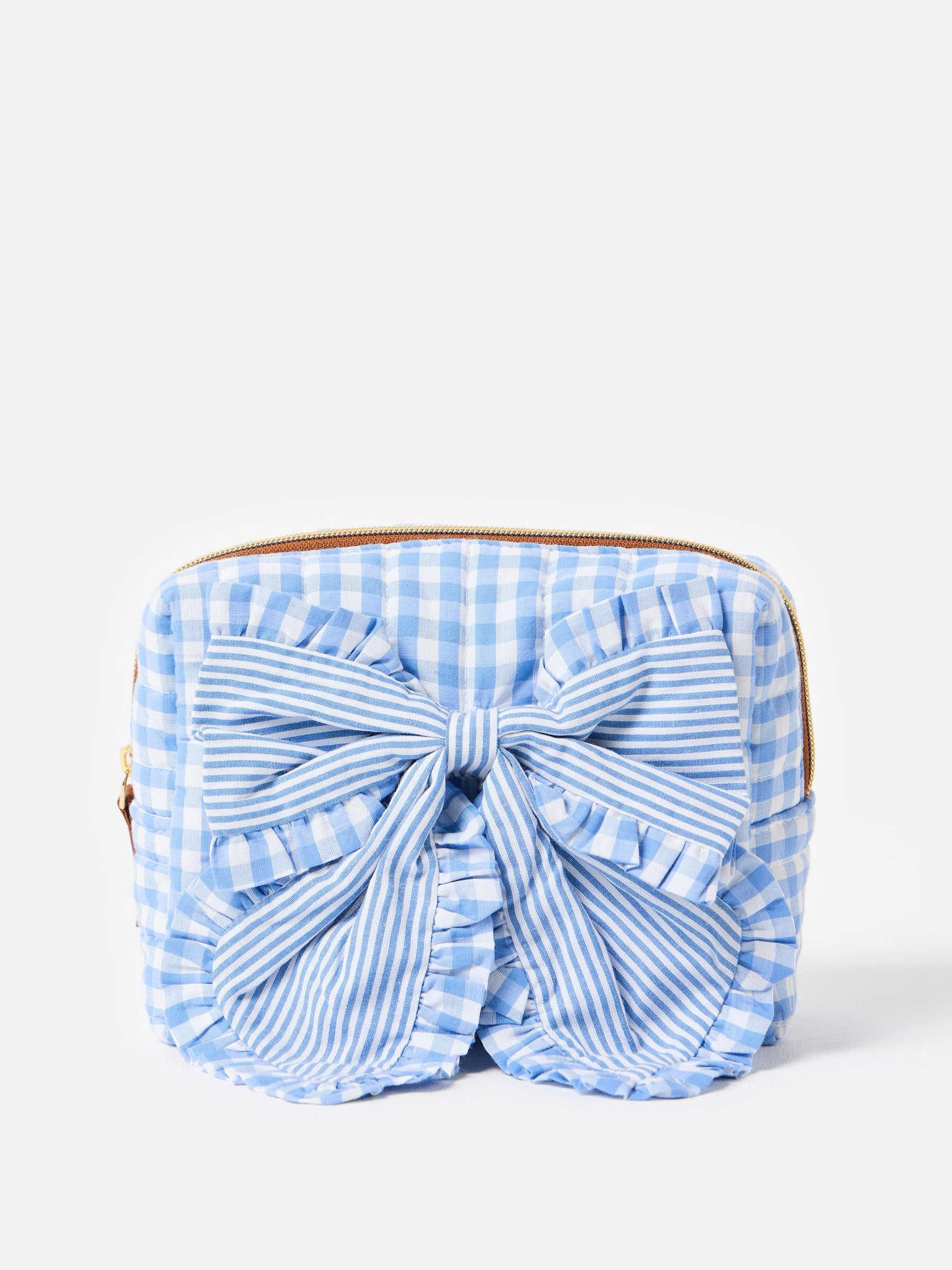 Oliver Bonas blue gingham bow wash bag (British brand)