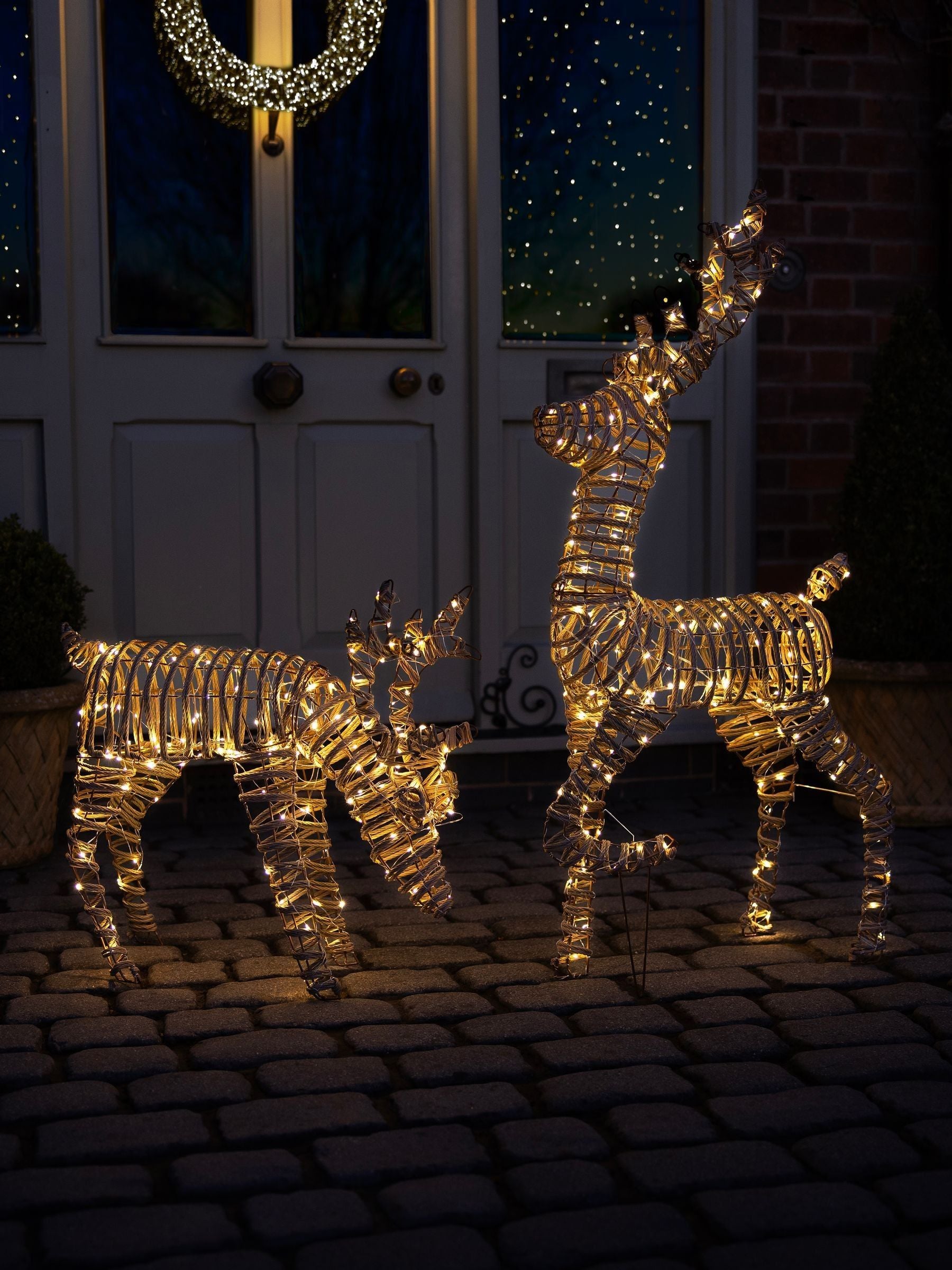 Charles Bentley small rattan light up reindeer, imported from the UK