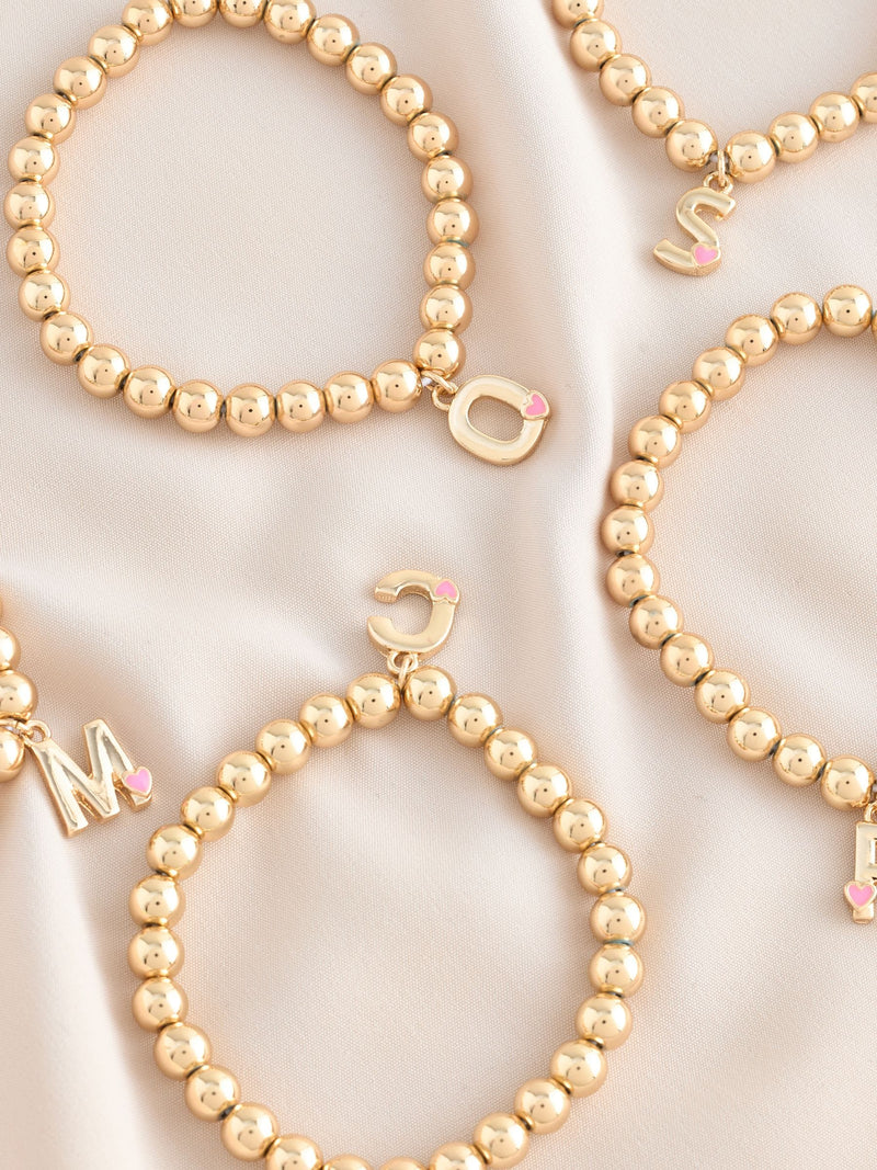 Gold tone initial heart bracelet jewellery, imported from the UK