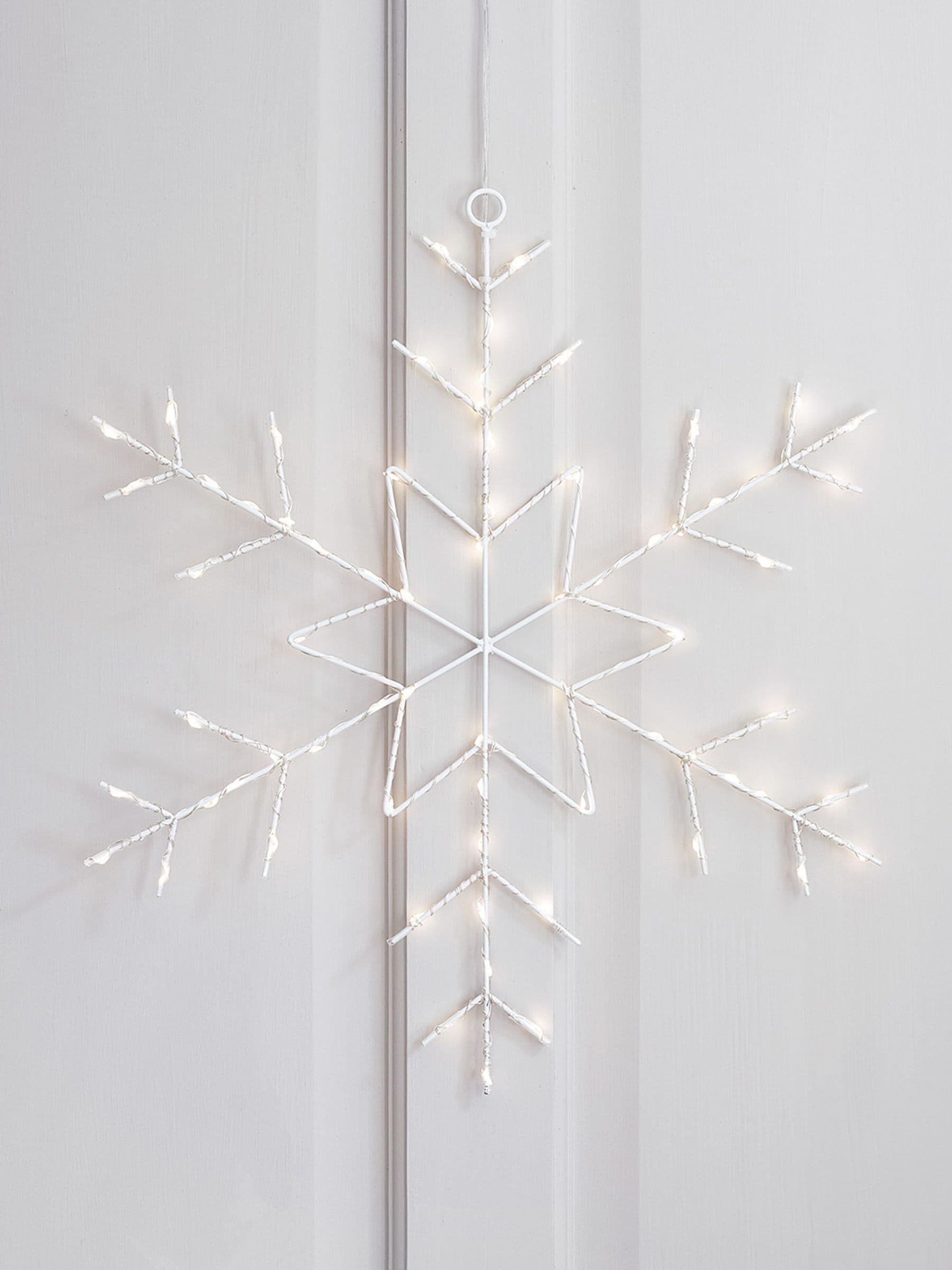Lights4fun snowflake Christmas light with warm white LEDs, imported from the UK