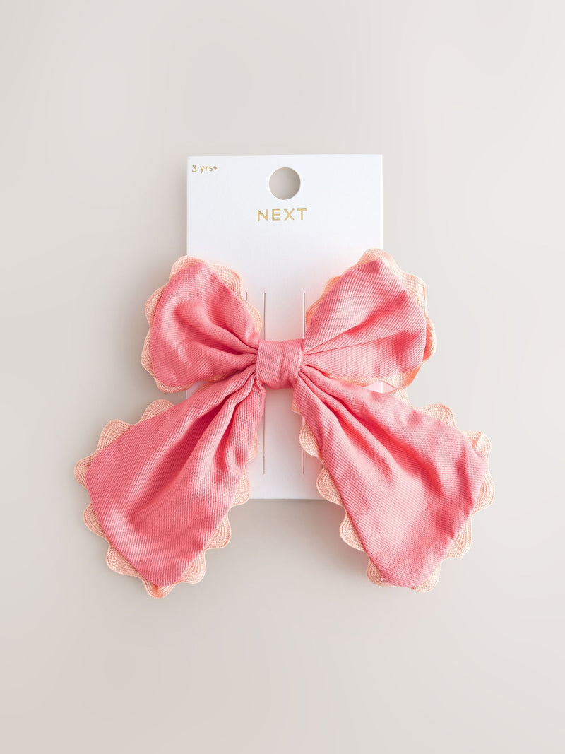 Ric Rac red bow clip, UK version