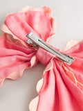 Ric Rac red bow clip, UK version