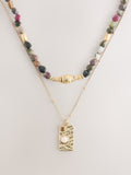 Semi-precious stone two-layer necklace with gold tone pendant, imported from the UK