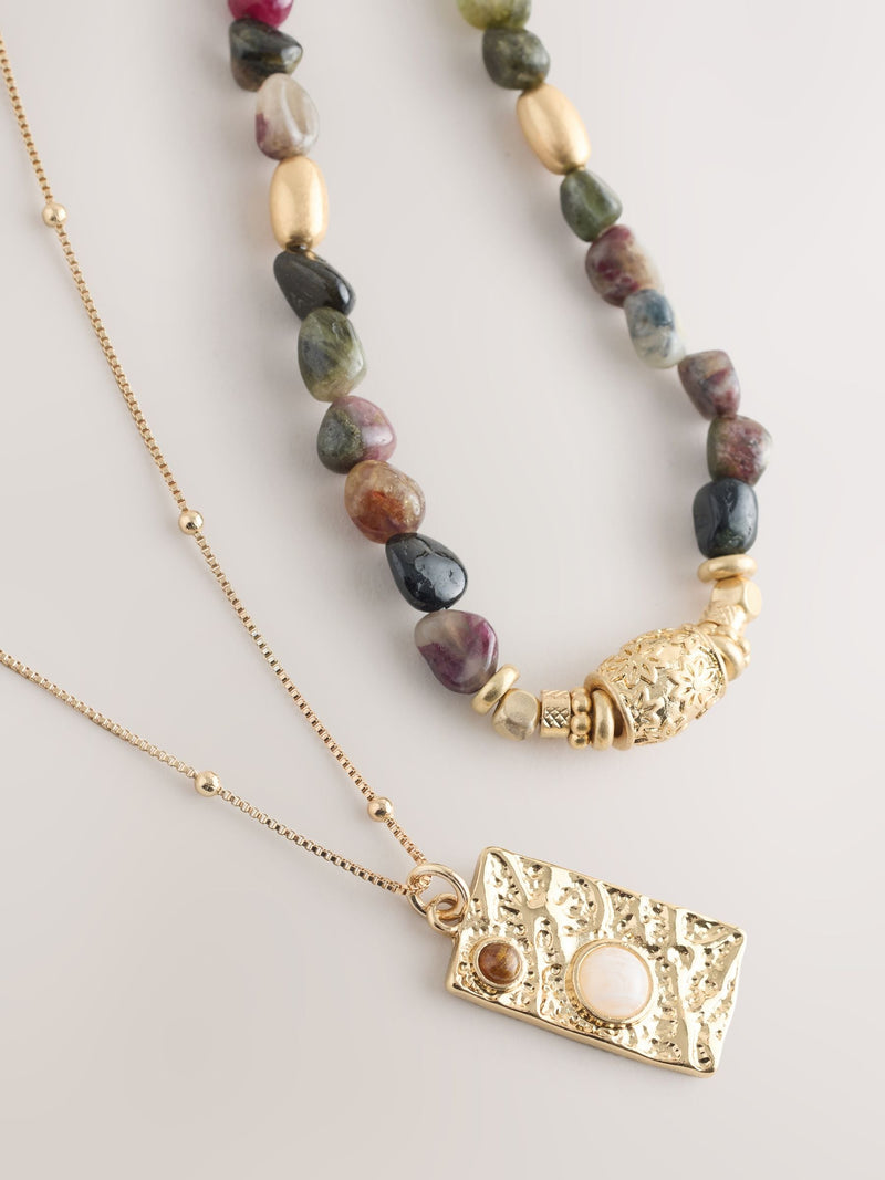 Semi-precious stone two-layer necklace with gold tone pendant, imported from the UK