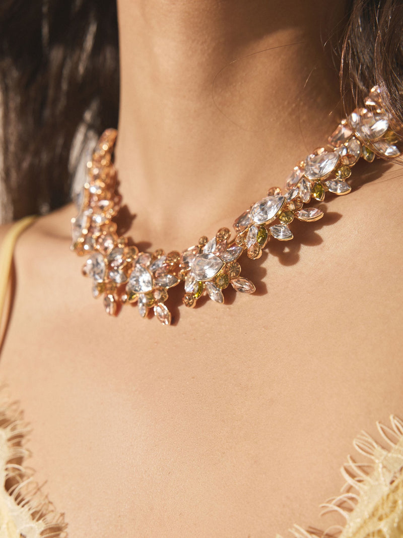 Gold tone collar necklace with pink sparkle and gemstones - British product