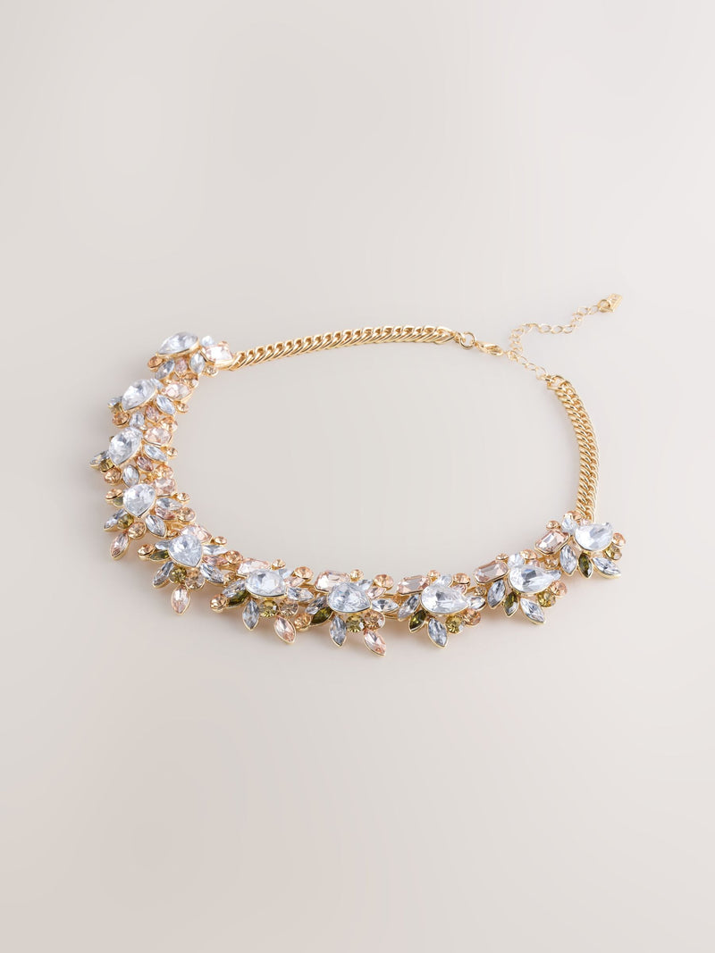 Gold tone collar necklace with pink sparkle and gemstones - British product