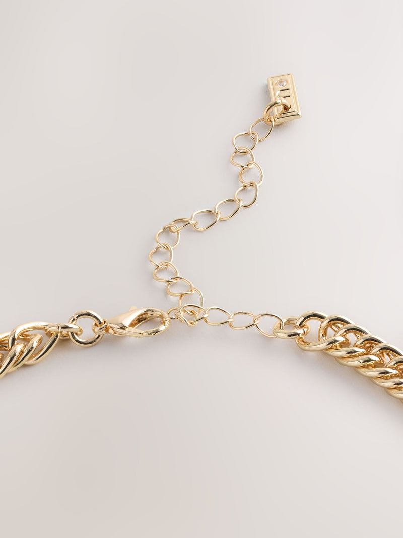 Gold tone collar necklace with pink sparkle and gemstones - British product