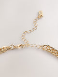 Gold tone collar necklace with pink sparkle and gemstones - British product