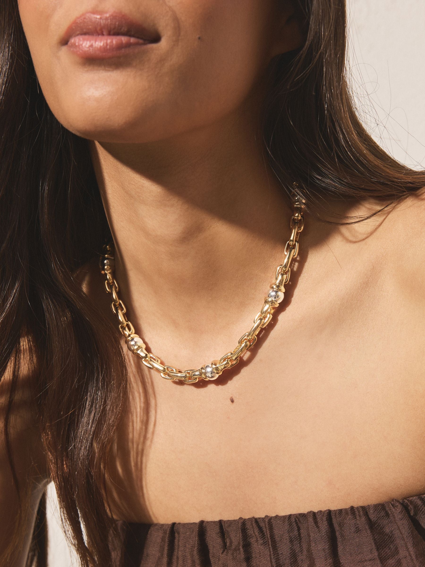 Gold and silver tone chunky chain necklace, UK version
