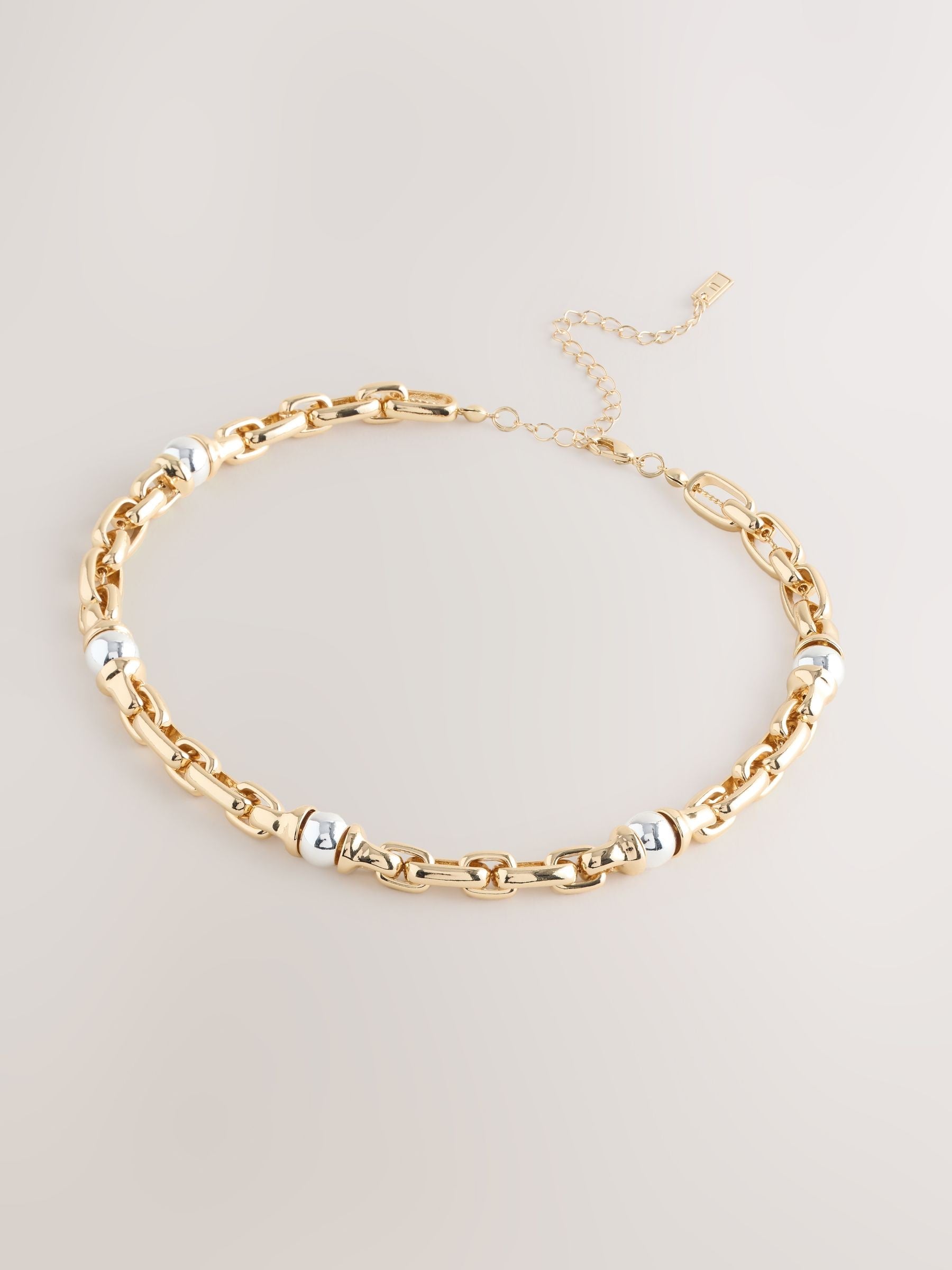 Gold and silver tone chunky chain necklace, UK version