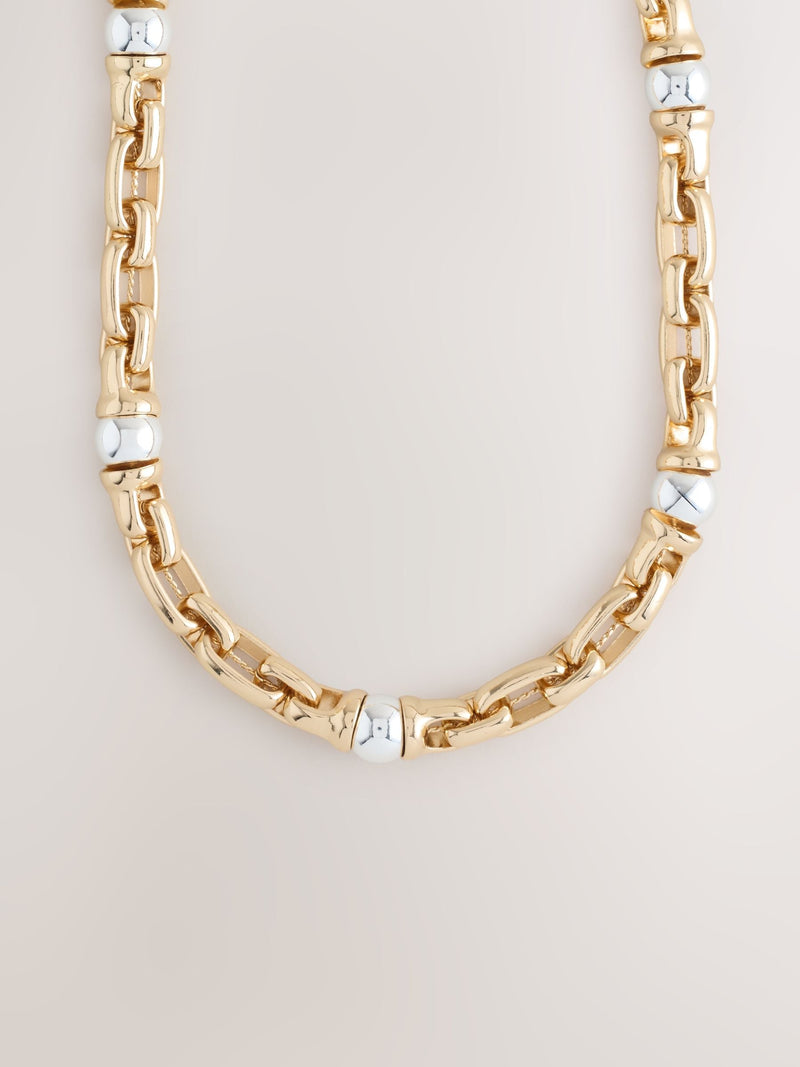 Gold and silver tone chunky chain necklace, UK version