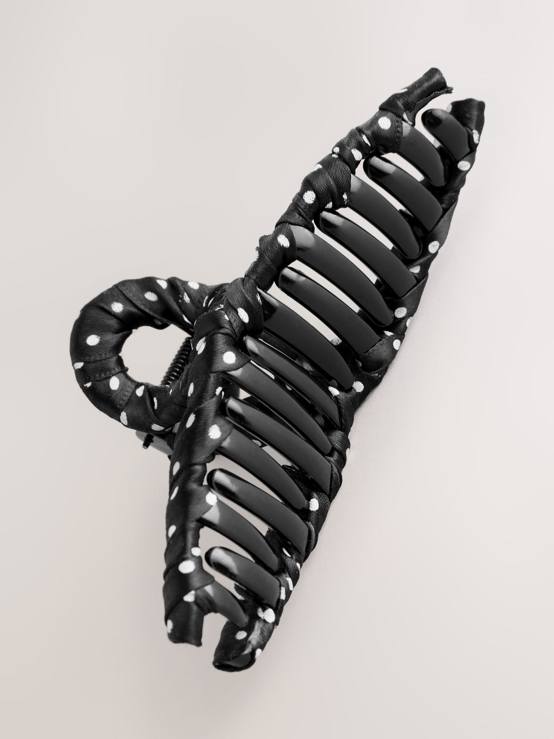 Polka dot fabric wrapped claw clip black and white, imported from the UK
