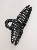 Polka dot fabric wrapped claw clip black and white, imported from the UK