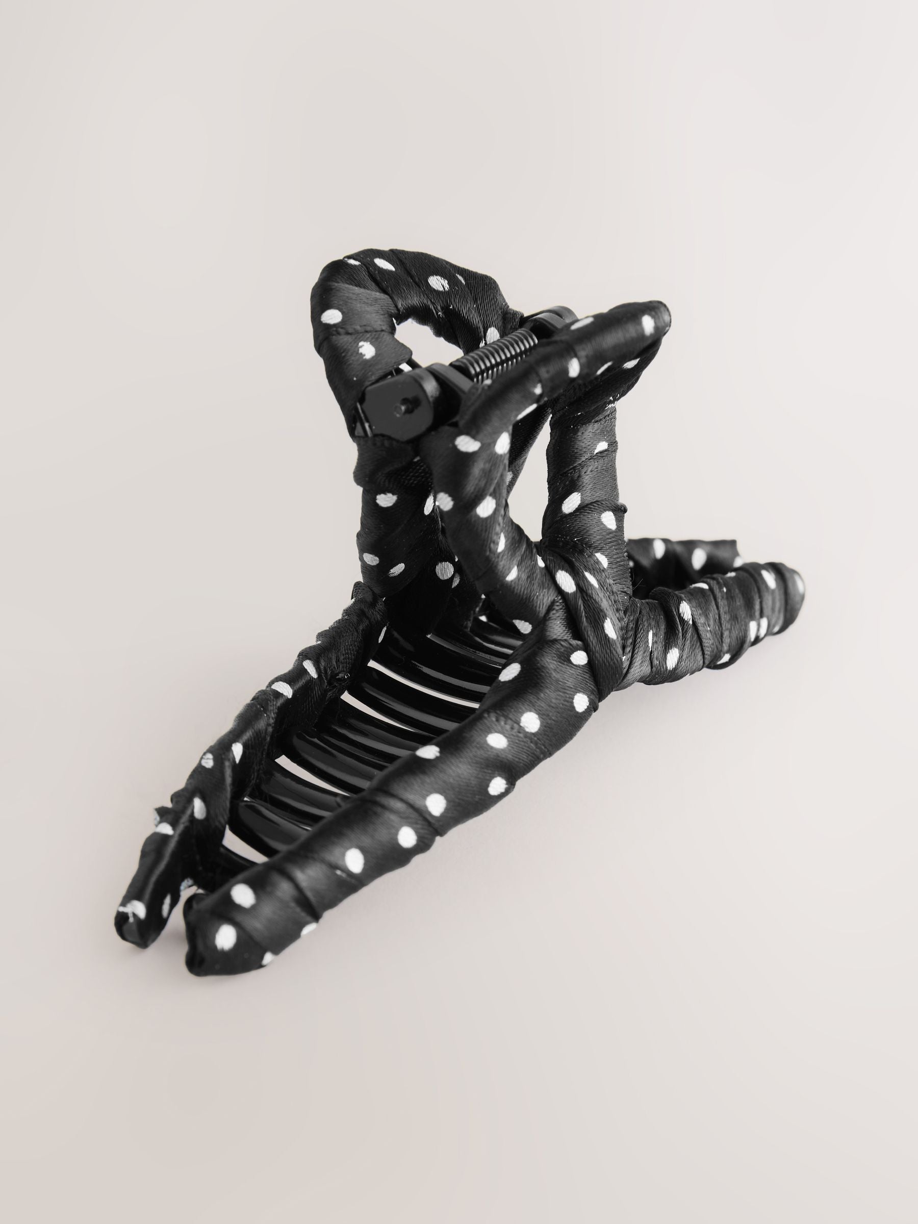 Polka dot fabric wrapped claw clip black and white, imported from the UK