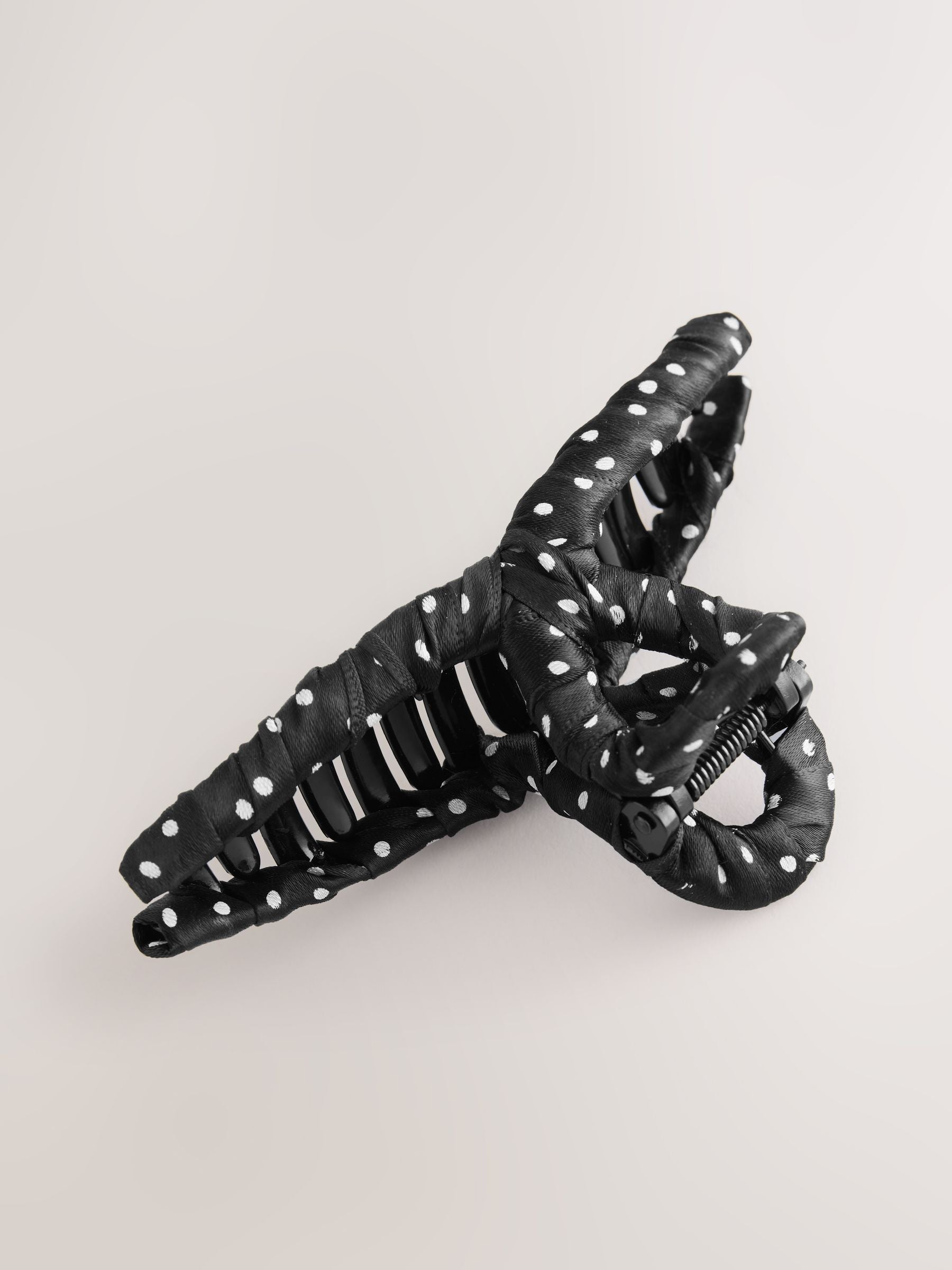 Polka dot fabric wrapped claw clip black and white, imported from the UK
