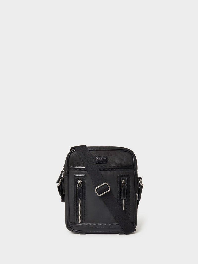 Osprey London Frontline black waxed canvas and leather messenger bag, imported from the UK