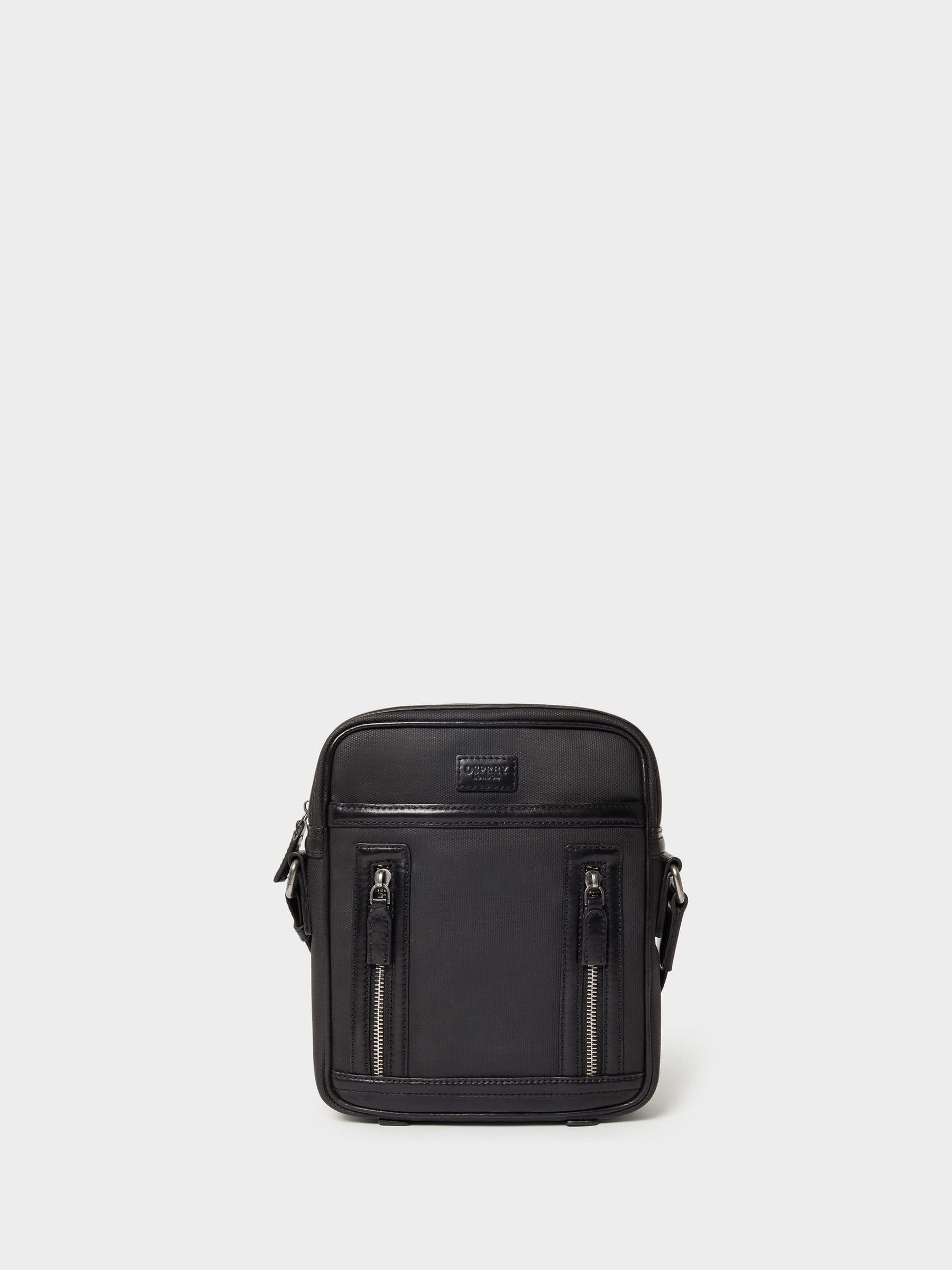 Osprey London Frontline black waxed canvas and leather messenger bag, imported from the UK