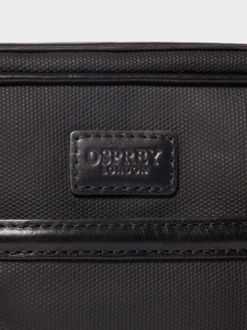 Osprey London Frontline black waxed canvas and leather messenger bag, imported from the UK