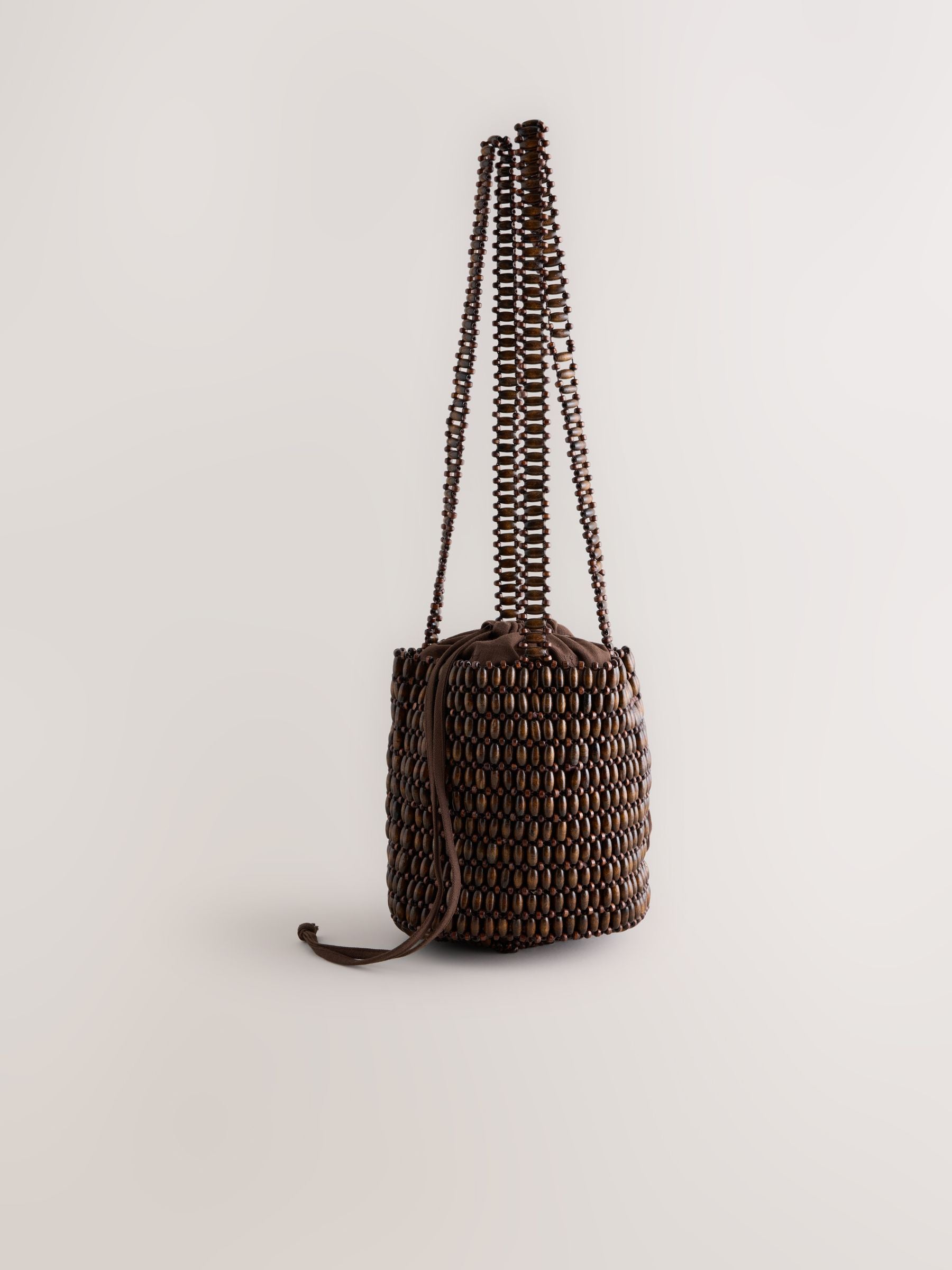 Wooden beaded shoulder bag in chocolate brown, imported from the UK