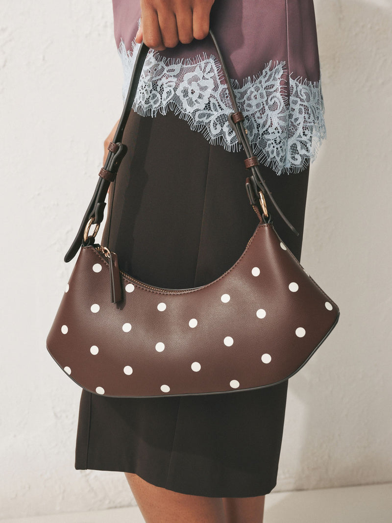 Chocolate brown polka dot scoop shoulder bag from a British brand
