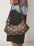 Chocolate brown polka dot scoop shoulder bag from a British brand