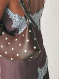 Chocolate brown polka dot scoop shoulder bag from a British brand