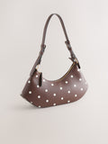 Chocolate brown polka dot scoop shoulder bag from a British brand