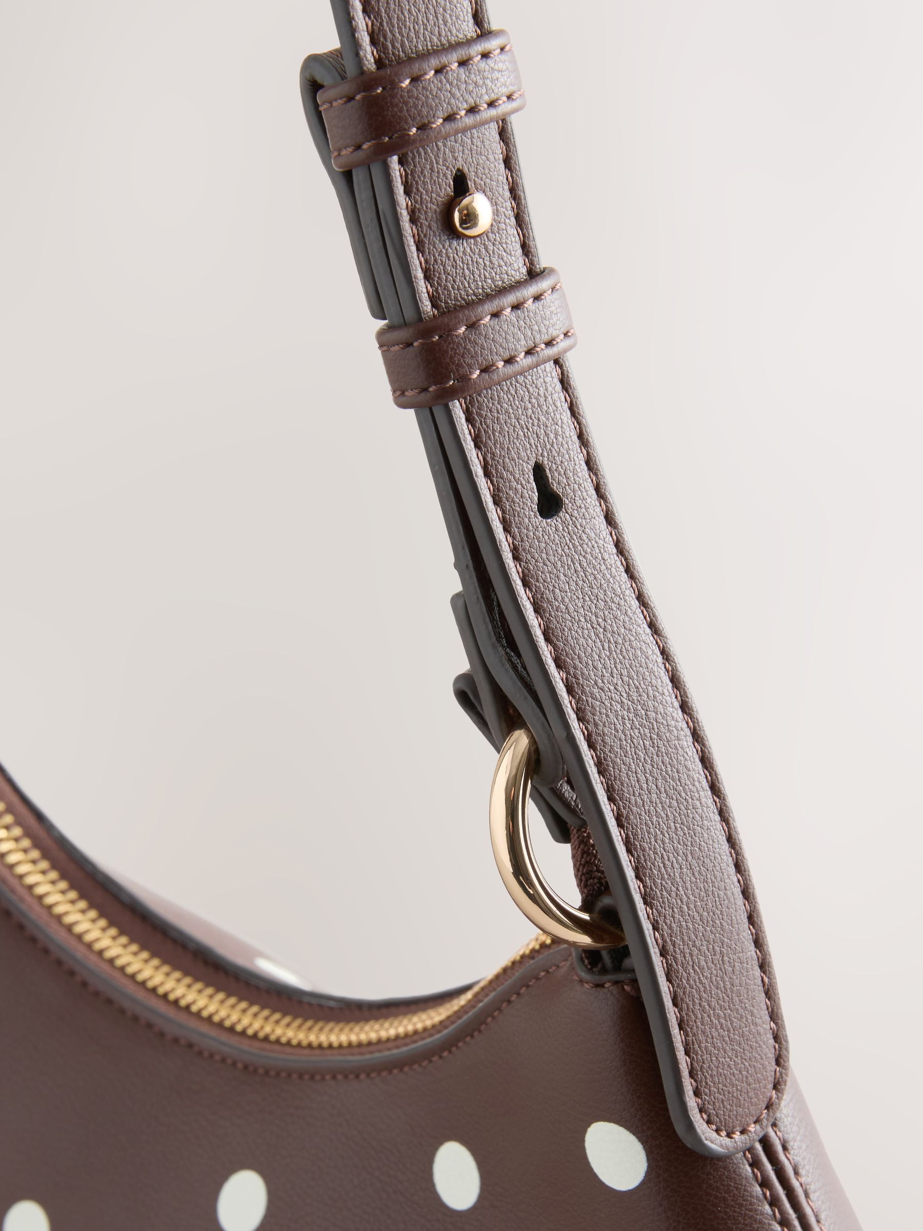 Chocolate brown polka dot scoop shoulder bag from a British brand