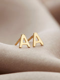 Posh Totty Designs petite 9ct gold initial stud earrings (British brand)